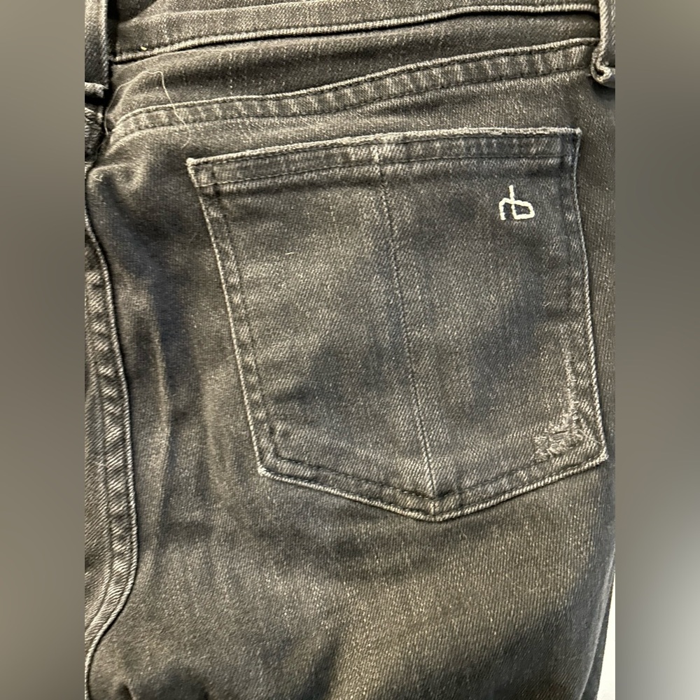 Distressed washed black jeans